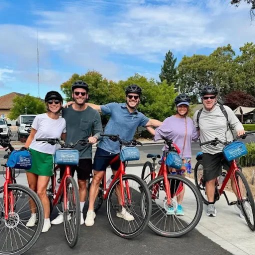 Group of cyclists on a wine-country ride near Duchamp Hotel Healdsburg.