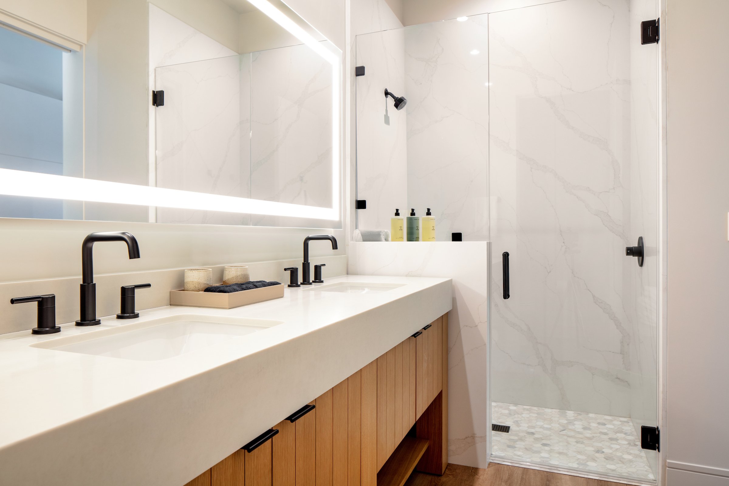 Upper Level Suite bathroom with walk-in shower and double vanity