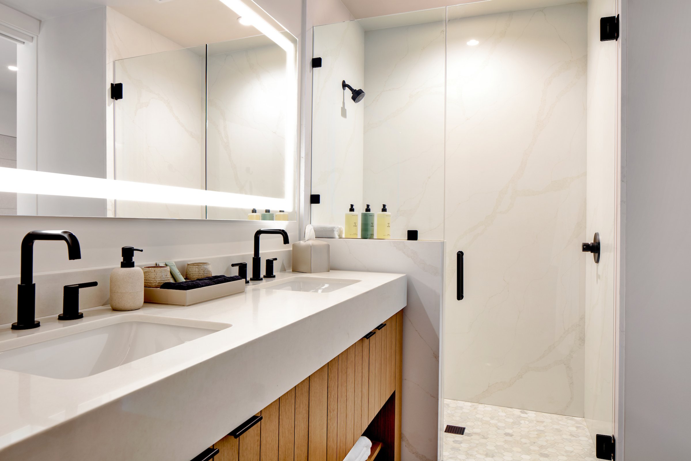 Garden Level Suite bathroom with walk-in shower and double vanity