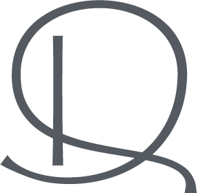 Abstract icon of a stylized letter Q enclosed in a circle.