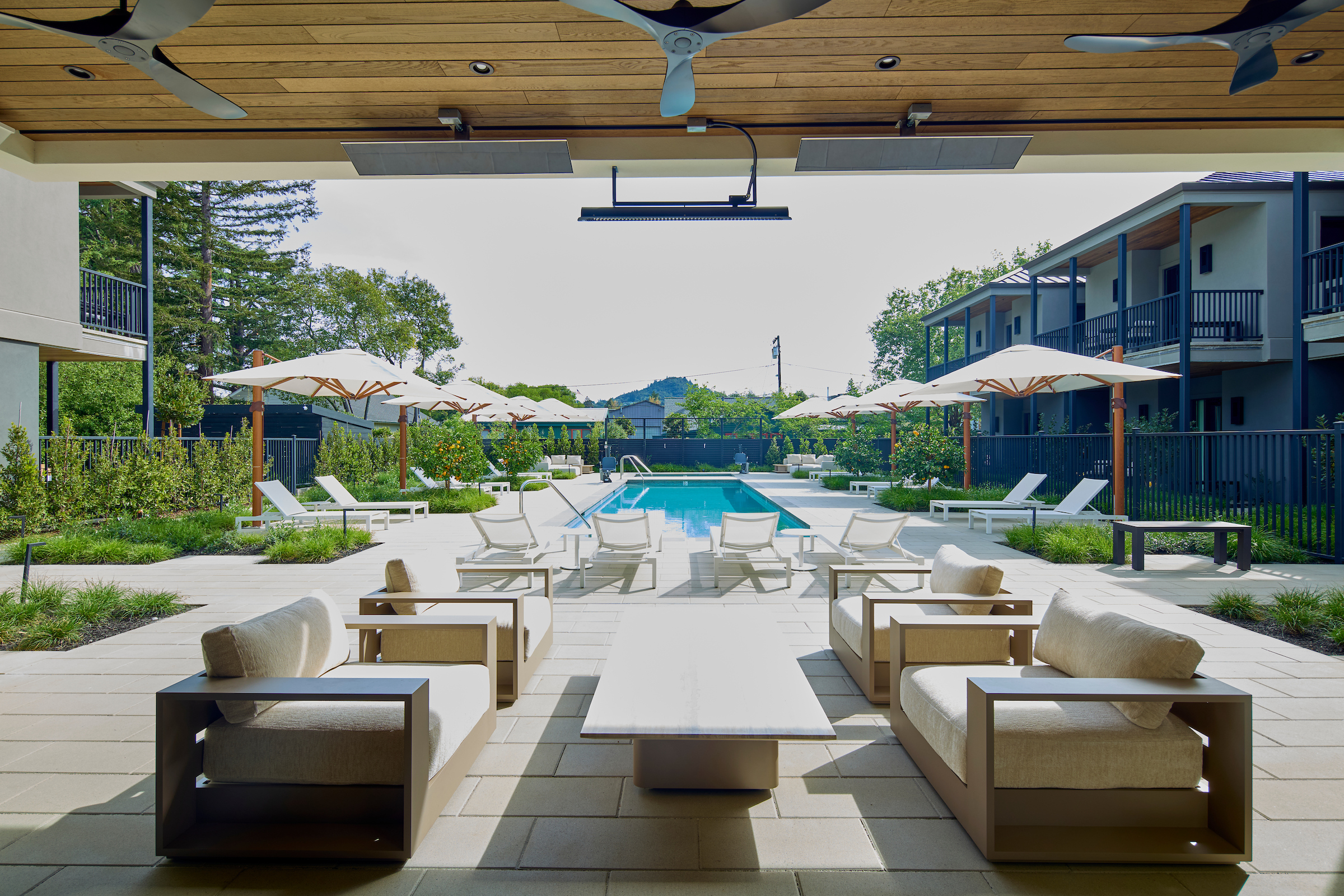The view from the lobby pool patio down the pool courtyard at Duchamp Healdsburg.